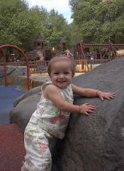 Addie climbing the rocks