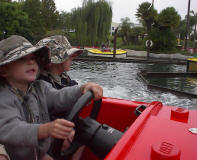 Jaedin drives his own boat at Legoland