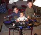 3kids20031230drummachine.jpg (109048 bytes)